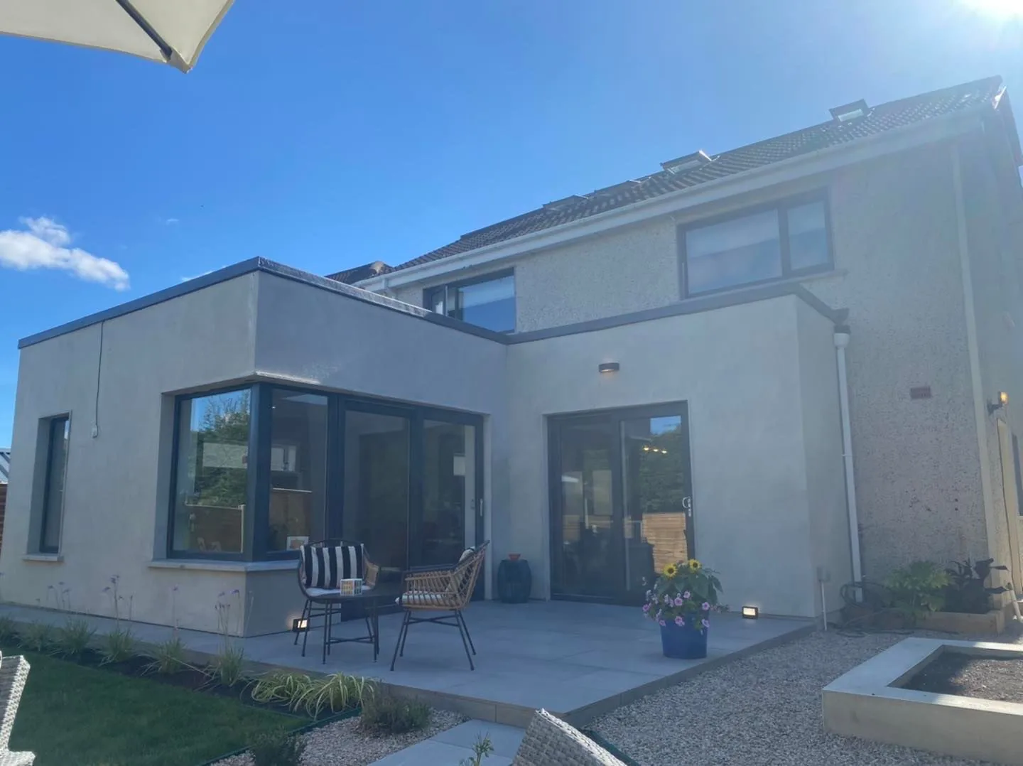 White render rear extension with corner picture window